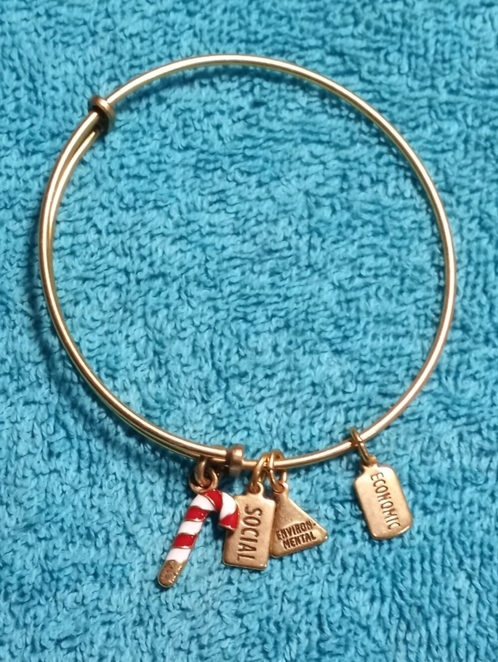 Gold Tone Holiday Charm Bangle Bracelet with Candy Cane Accent